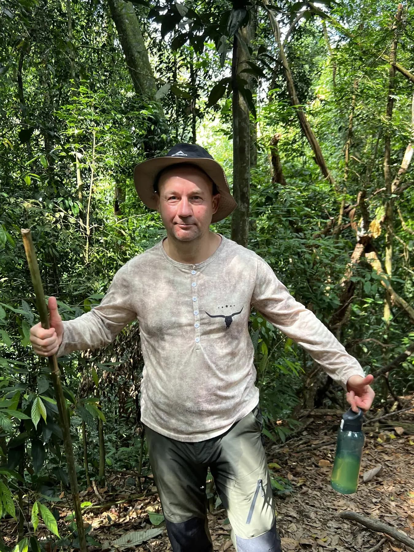 Local guide preparing for an orangutan trek near Bukit Lawang